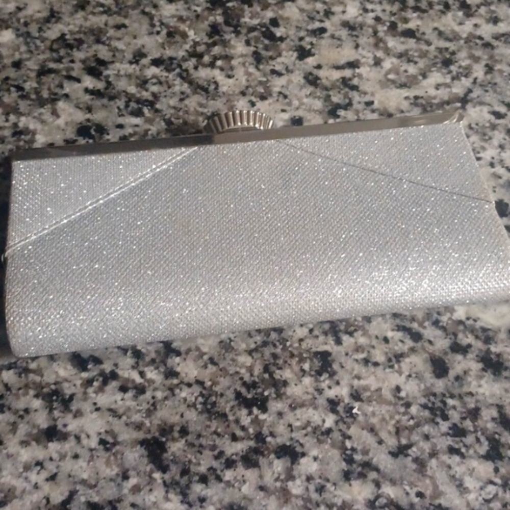 Camille la vie clutch purse its missing the stone on the closing part